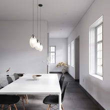 Load image into Gallery viewer, Liquid LED Pendant Light in dining room.