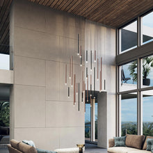 Load image into Gallery viewer, A-Tube Nano LED Pendant Light in living room.