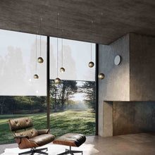 Load image into Gallery viewer, Spider LED Mini Pendant Light in living room.