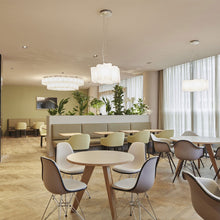 Load image into Gallery viewer, Logico Triple Nested Pendant Light in restaurant.
