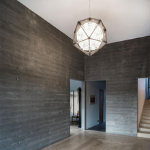 Load image into Gallery viewer, OE Quasi Pendant Light in living room.