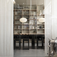 Load image into Gallery viewer, Patera Oval Pendant Light in living room.