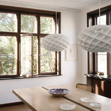 Load image into Gallery viewer, Patera Oval Pendant Light in dining room.