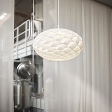 Load image into Gallery viewer, Patera Oval Pendant Light in living room.