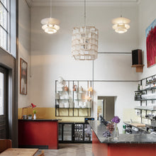 Load image into Gallery viewer, PH 5-4½ Pendant Light in restaurant.