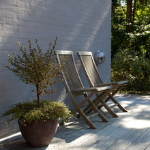 Load image into Gallery viewer, Skot LED Wall Light in Outside Area.