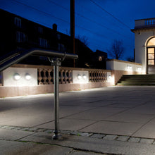 Load image into Gallery viewer, Skot LED Wall Light in Outside Area.