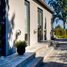 Load image into Gallery viewer, Skot LED Wall Light in Outside Area.