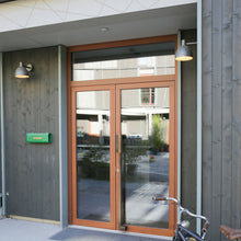 Load image into Gallery viewer, Toldbod Wall Light in Outside Area.