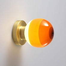 Load image into Gallery viewer, Dipping Light A2 LED Wall Light in Amber/Brushed Brass.
