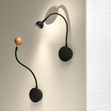 Load image into Gallery viewer, N. Ocho LED Wall Light in living room.