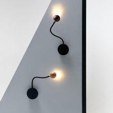 Load image into Gallery viewer, N. Ocho LED Wall Light in living room.