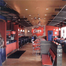 Load image into Gallery viewer, Brisa 2000 Ceiling Fan in restaurant.