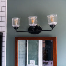 Load image into Gallery viewer, Acadia Bath Vanity Light in bathroom.