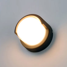Load image into Gallery viewer, Eyebrow Round Outdoor LED Wall Light in Detail.