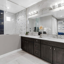 Load image into Gallery viewer, Silo Bath Vanity Light in bathroom.