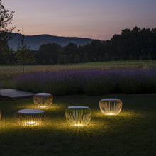 Load image into Gallery viewer, Meridiano Outdoor LED Floor Lamp in outside area.