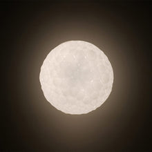 Load image into Gallery viewer, Meteorite Pendant Light in Detail.