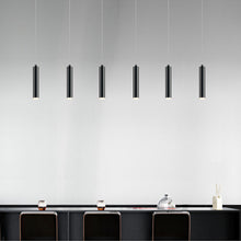 Load image into Gallery viewer, Micro Tube LED Pendant Light in room.