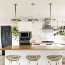 Load image into Gallery viewer, Milo Disc Pendant Light in dining room.