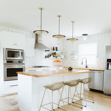 Load image into Gallery viewer, Milo Disc Pendant Light in dining room.