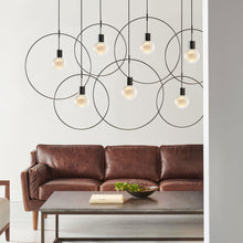 Load image into Gallery viewer, Mina Single LED Pendant Light in living room.