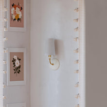 Load image into Gallery viewer, Rhea Wall Light in living room.