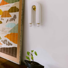 Load image into Gallery viewer, Roshani Wall Light in living room.