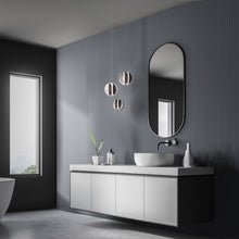 Load image into Gallery viewer, Carillion LED Pendant Light in bathroom.