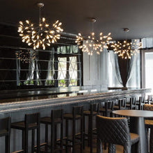 Load image into Gallery viewer, Heracleum III LED Pendant Light in restaurant.