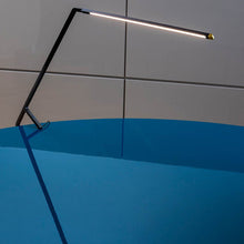 Load image into Gallery viewer, Bird LED Table Lamp in exhibition.
