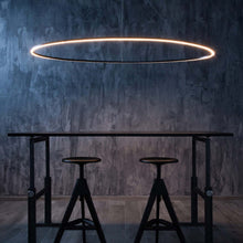 Load image into Gallery viewer, Ellisse LED Mega Pendant Light in restaurant.