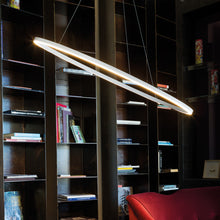 Load image into Gallery viewer, Ellisse LED Minor Pendant Light in living room.
