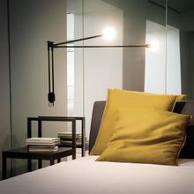 Load image into Gallery viewer, Potence Pivotante Wall Light in bedroom.