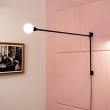 Load image into Gallery viewer, Potence Pivotante Wall Light in bedroom.