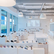Load image into Gallery viewer, Nur Suspension Light in exhibition.