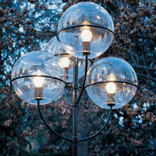 Load image into Gallery viewer, Lyndon Outdoor Floor Lamp in outside area.