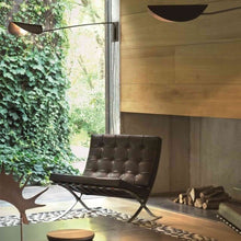 Load image into Gallery viewer, Plume Wall Light in living room.