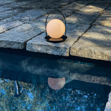 Load image into Gallery viewer, Bola Outdoor LED Lantern in Outside Area.