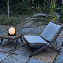 Load image into Gallery viewer, Bola Outdoor LED Lantern in Outside Area.