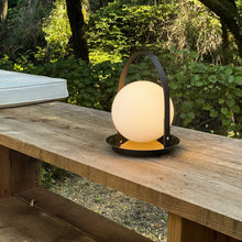Load image into Gallery viewer, Bola Outdoor LED Lantern in Outside Area.