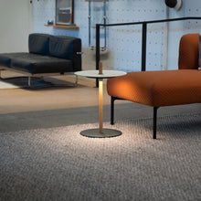 Load image into Gallery viewer, Nivel Pedestal LED Table Lamp in living room.
