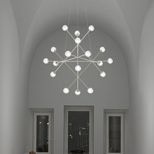 Load image into Gallery viewer, Proton™ Beta LED Pendant Light in living room.