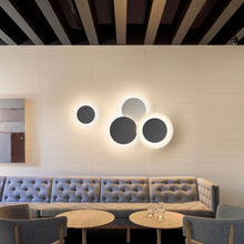 Load image into Gallery viewer, Puck 5491 LED Wall Art Light in living room.