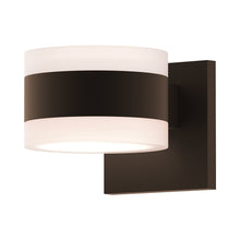 Load image into Gallery viewer, Reals Up/Down Outdoor LED Wall Light in Textured Bronze/White Cylinder Lens/White Cylinder Lens.