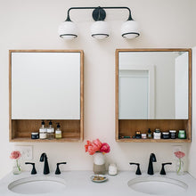Load image into Gallery viewer, Reese Wall Light in bathroom.