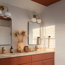 Load image into Gallery viewer, Reese Wall Light in bathroom.