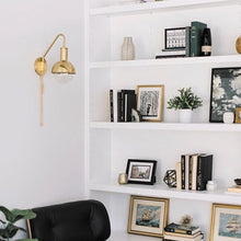 Load image into Gallery viewer, Riley Wall Light in living room.