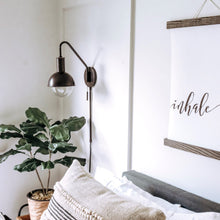 Load image into Gallery viewer, Riley Wall Light in bedroom.