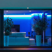 Load image into Gallery viewer, Starfish Wifi Smart LED Color-Changing 4 Inch Recessed Downlight in living room.